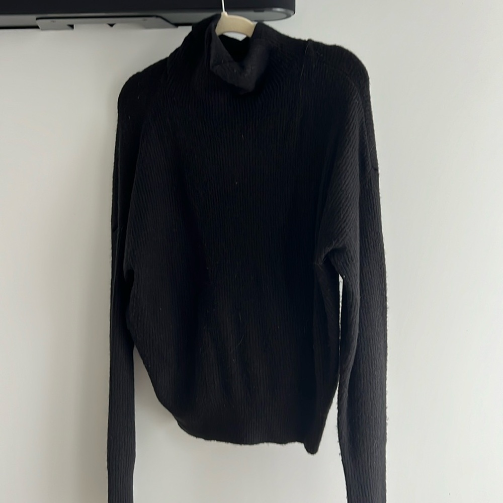 Black turtle neck sweater